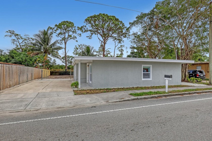 Step into this Palm Beach gem, a fully renovated 3-bedroom - Beach Home for sale in West Palm Beach, Florida on Beachhouse.com