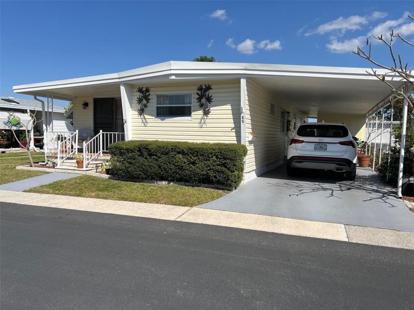 Situated within the picturesque landscape of Palm Hill Country - Beach Home for sale in Largo, Florida on Beachhouse.com