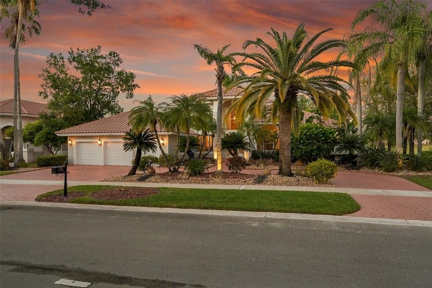 Stunning custom-built 5-bedroom, 4.5-bath lakefront pool home in - Beach Home for sale in Coral Springs, Florida on Beachhouse.com
