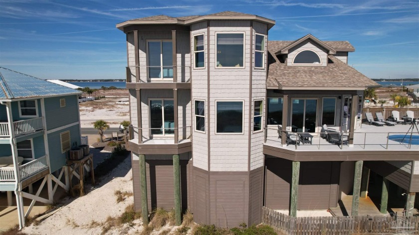 This property is a spacious and elegant Gulf front residence - Beach Home for sale in Navarre Beach, Florida on Beachhouse.com