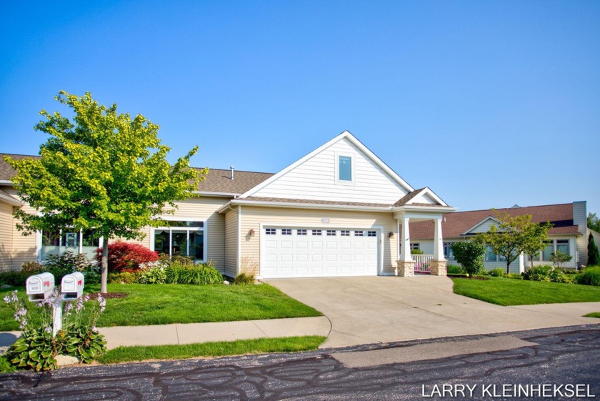 Custom built condo with 2 fireplaces, custom kitchen with - Beach Condo for sale in Holland, Michigan on Beachhouse.com