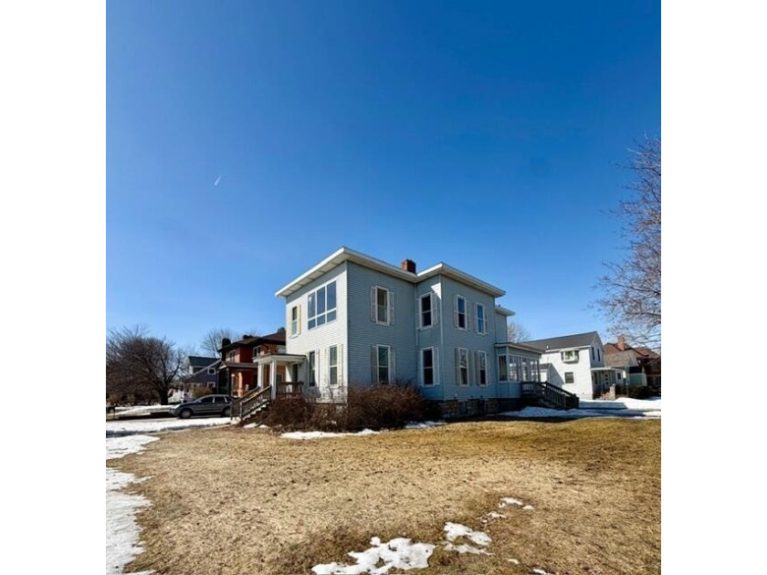 This 1890 historic, diamond in the rough 6 bedroom home offers a - Beach Home for sale in Alpena, Michigan on Beachhouse.com