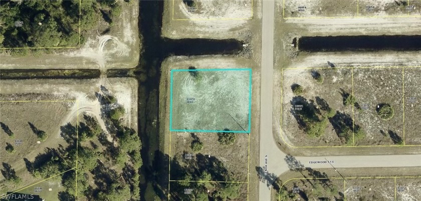 Great oversized corner lot with water on two sides, Very private - Beach Lot for sale in Lehigh Acres, Florida on Beachhouse.com