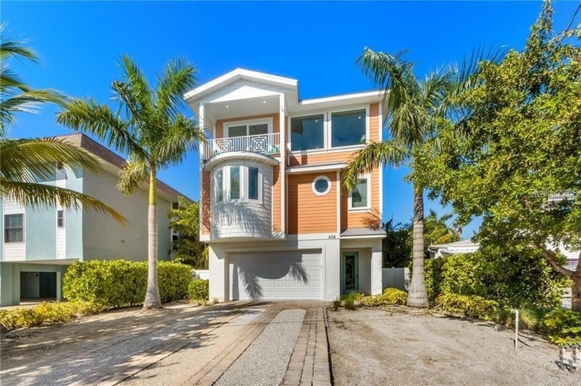 This exquisite home strikes a balance between classic coastal - Beach Home for sale in Bradenton Beach, Florida on Beachhouse.com