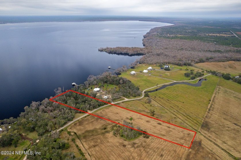 Build your dream home on this stunning 5.89 +/- acre lakefront - Beach Acreage for sale in Bunnell, Florida on Beachhouse.com