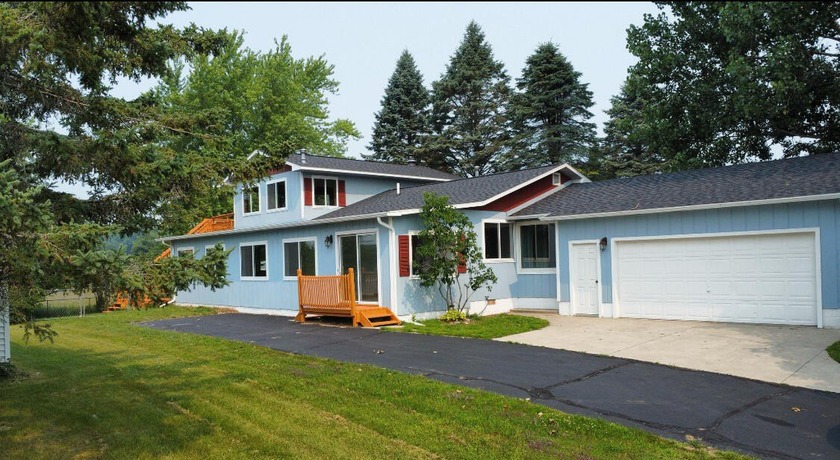 This peaceful Harrisville home, nestled along the fairways of - Beach Home for sale in Harrisville, Michigan on Beachhouse.com