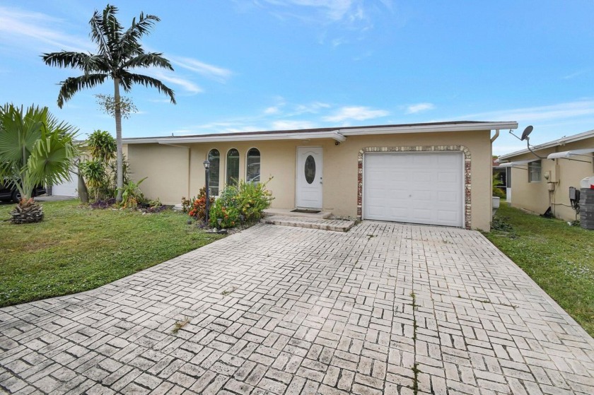 Motivated Seller. Just added a brand new A/C. Step into this - Beach Home for sale in Pompano Beach, Florida on Beachhouse.com