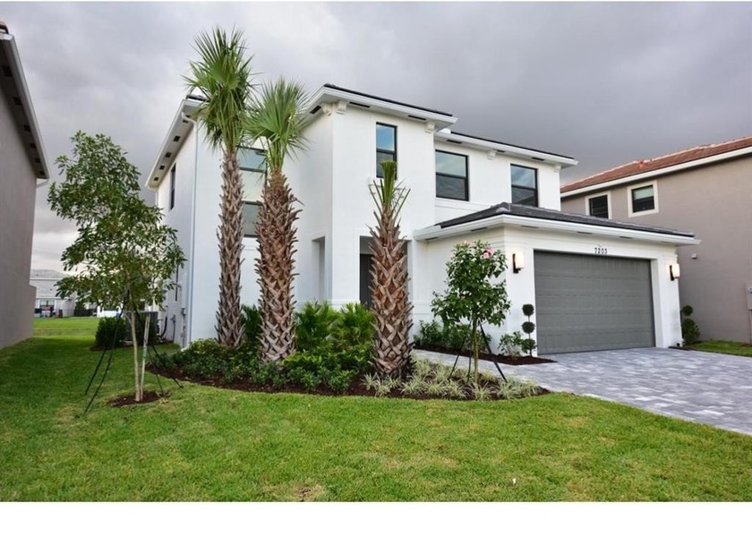 This 2022 new-construction SMART home in a gated Villamar - Beach Home for sale in Lake Worth, Florida on Beachhouse.com