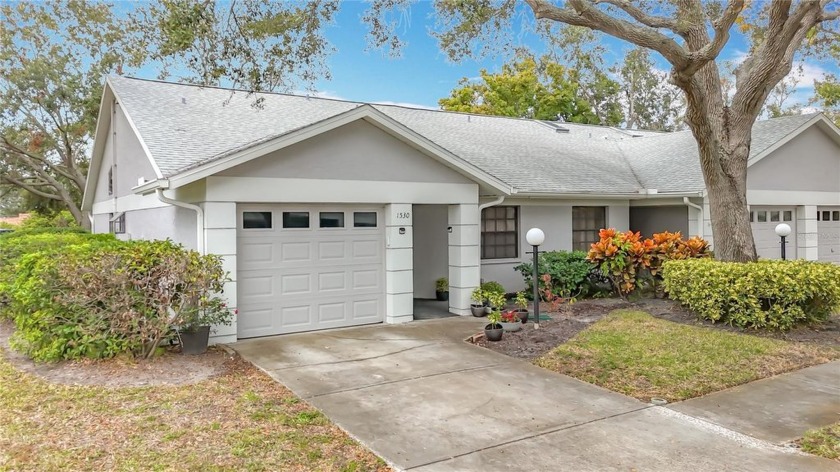 Dunedin - Embrace the Florida lifestyle with this impeccably - Beach Home for sale in Dunedin, Florida on Beachhouse.com