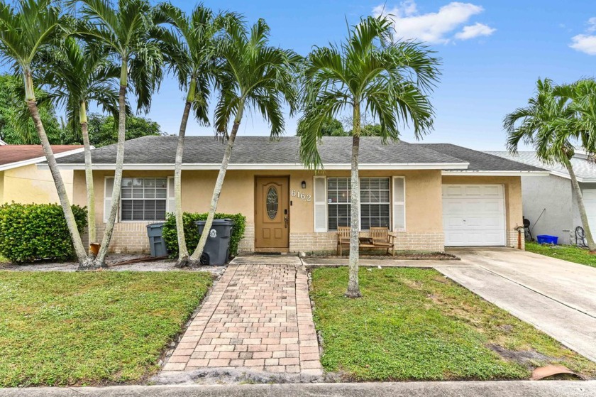 Discover the perfect blend of comfort and style in this charming - Beach Home for sale in Lake Worth, Florida on Beachhouse.com