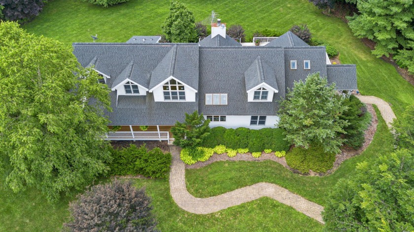 Discover tranquility and luxury in this 5-bedroom, 4-bathroom - Beach Home for sale in Three Oaks, Michigan on Beachhouse.com