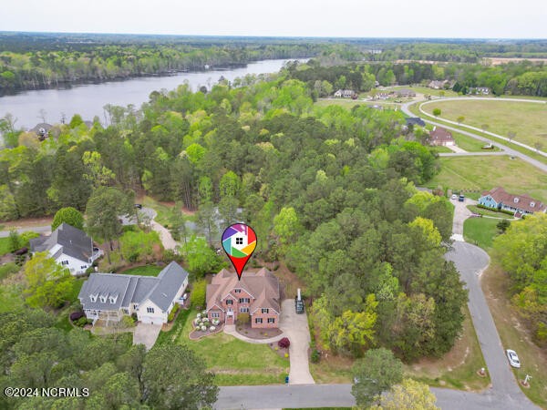 120 New River Drive is located in a gated golfing and waterfront - Beach Home for sale in Hertford, North Carolina on Beachhouse.com