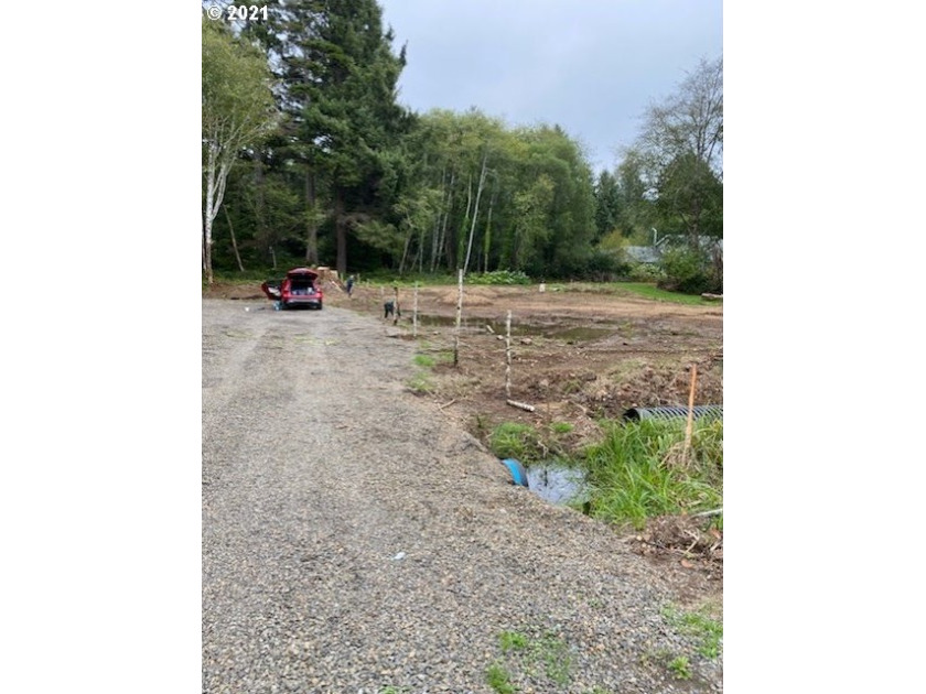 This is an opportunity to own or invest in a coastal lot. Enjoy - Beach Lot for sale in Rockaway Beach, Oregon on Beachhouse.com