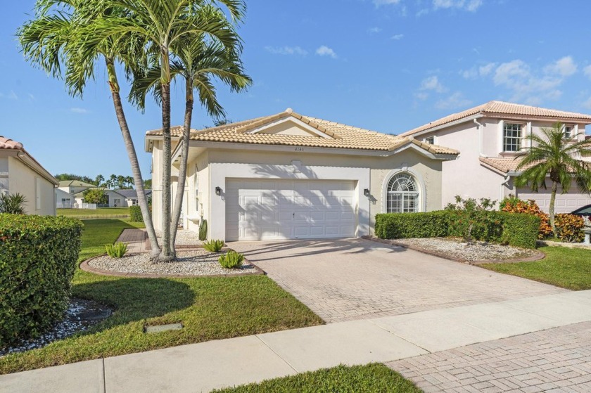 This pristine lakefront home is in exceptional condition. The - Beach Home for sale in Wellington, Florida on Beachhouse.com