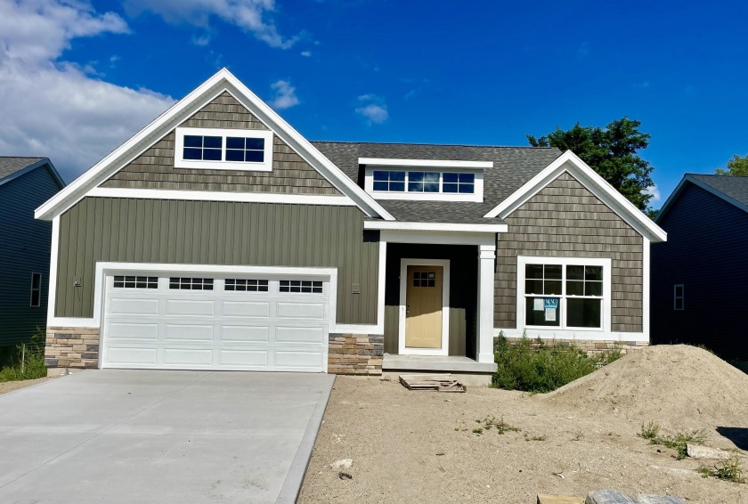 This new construction Ranch Style home was built by the Award - Beach Home for sale in Spring Lake, Michigan on Beachhouse.com