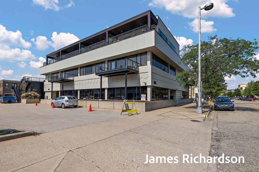 LOCATION & OPPORTUNITY-Step into luxury with this newly built - Beach Condo for sale in Grand Haven, Michigan on Beachhouse.com