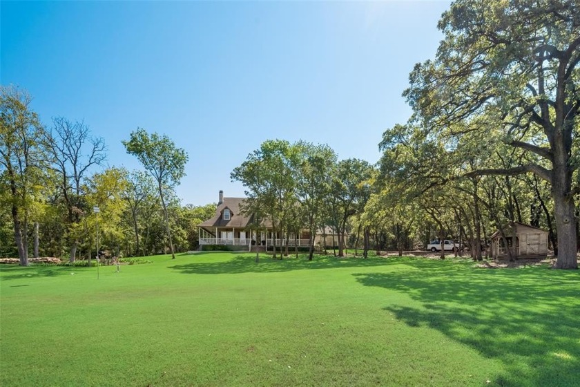 Nestled on a breathtaking 17.867-acre estate, this remarkable - Beach Home for sale in Keller, Texas on Beachhouse.com