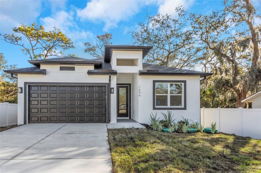 Welcome home! No FLOOD insurance required & NO HOA. This Modern - Beach Home for sale in Tarpon Springs, Florida on Beachhouse.com