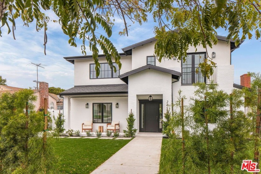This modern traditional, new-construction home has just been - Beach Home for sale in Santa Monica, California on Beachhouse.com