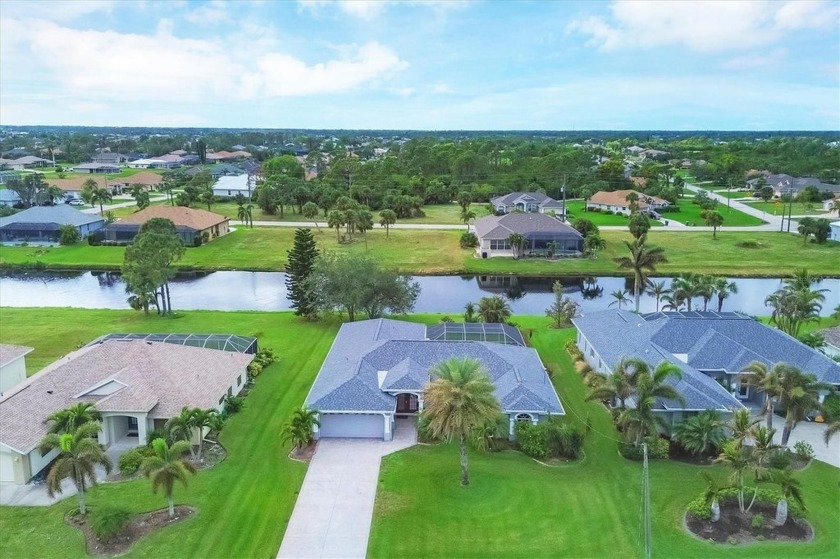 Discover this turnkey 4-bedroom, 3-bathroom pool home, nestled - Beach Home for sale in Rotonda West, Florida on Beachhouse.com