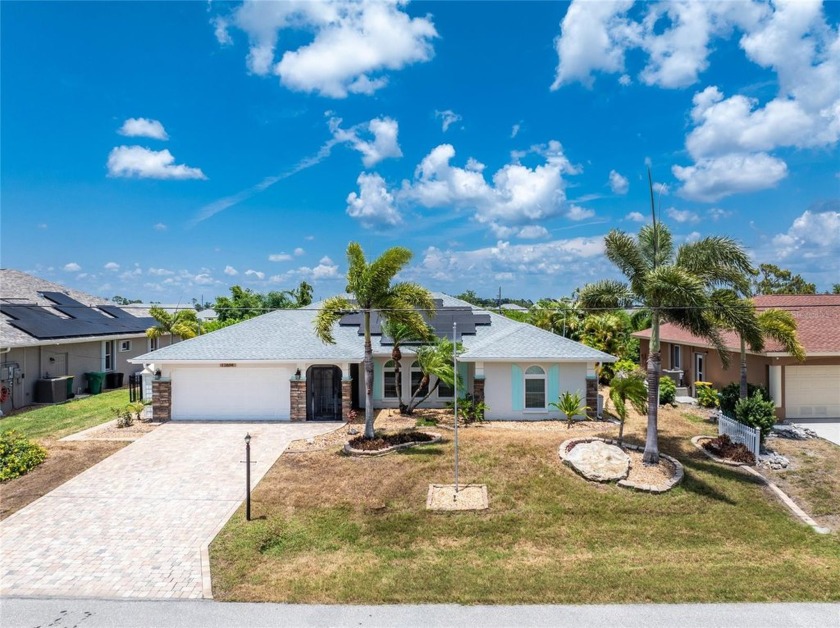 This lovely GULF ACCESS, HEATED POOL, DOCK & LIFT, IMPACT - Beach Home for sale in Port Charlotte, Florida on Beachhouse.com