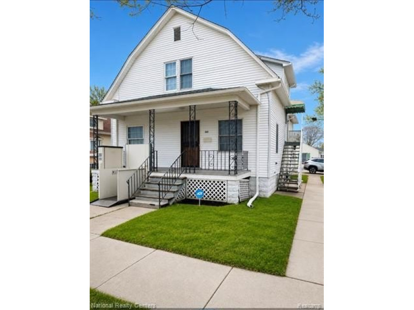 Great value with tons of potential! This charming corner home - Beach Home for sale in Bay City, Michigan on Beachhouse.com