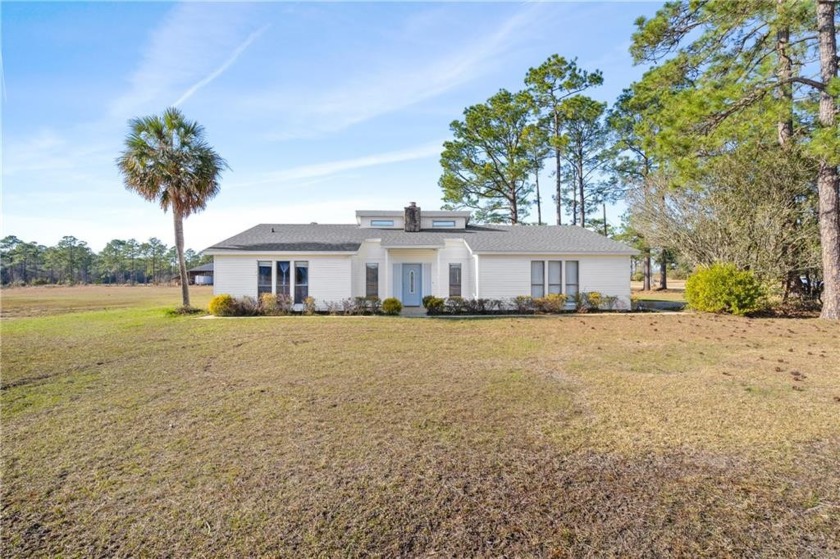 This home nestled on approximately 2.76 acres has been updated - Beach Home for sale in Theodore, Alabama on Beachhouse.com