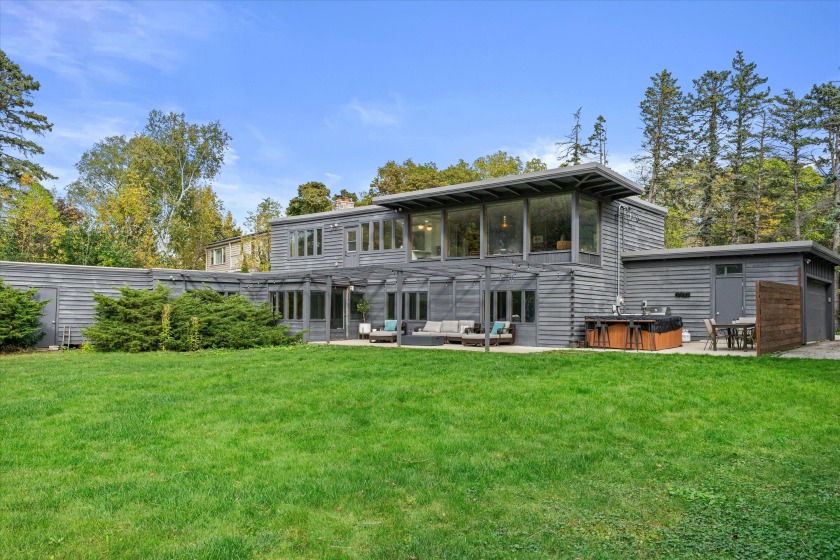 Welcome home to this fabulous mid century modern split level - Beach Home for sale in Fox Point, Wisconsin on Beachhouse.com