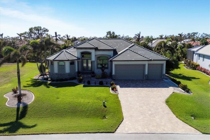 Stunning custom pool home in the desirable Cape Haze Windward - Beach Home for sale in Placida, Florida on Beachhouse.com