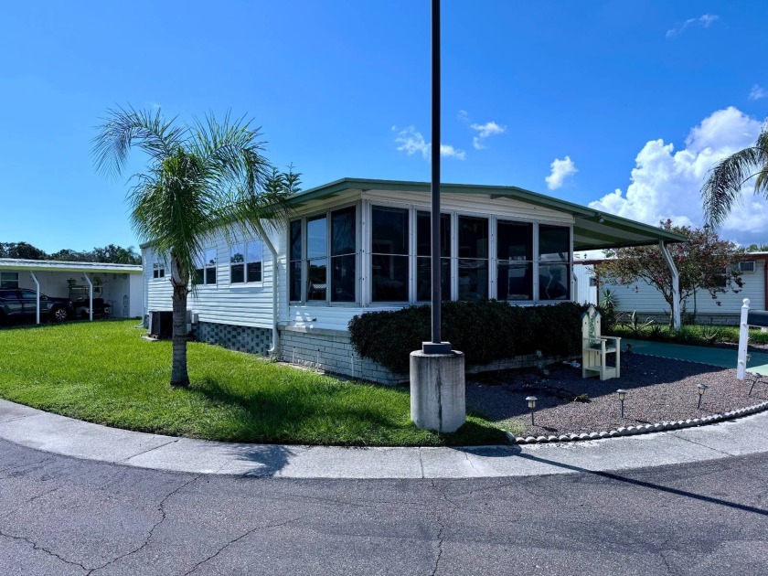 Welcome to this furnished 2-bedroom, 1.5-bath home nestled in an - Beach Home for sale in Dunedin, Florida on Beachhouse.com