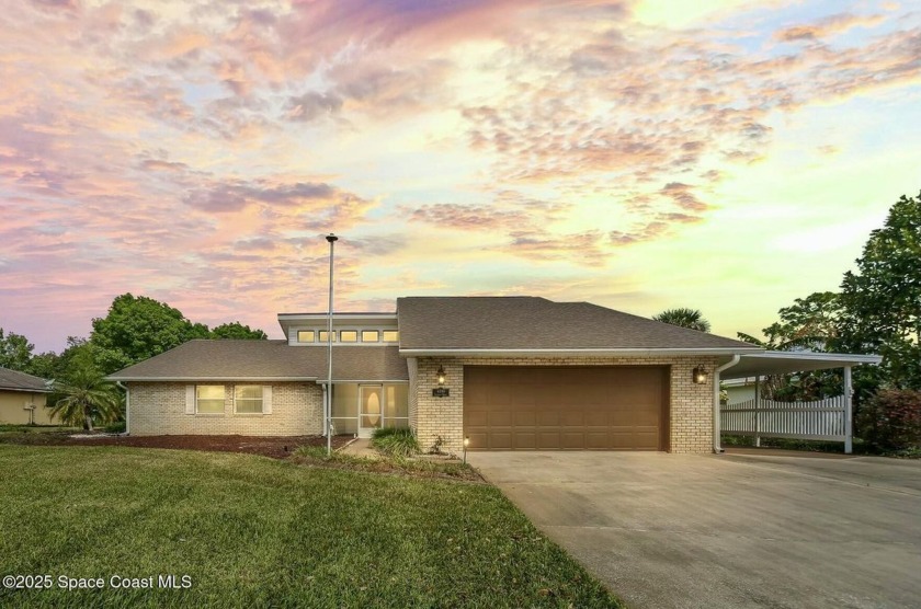 Discover this one-of-a-kind 3-bedroom, 2.5-bath home, offering - Beach Home for sale in Titusville, Florida on Beachhouse.com