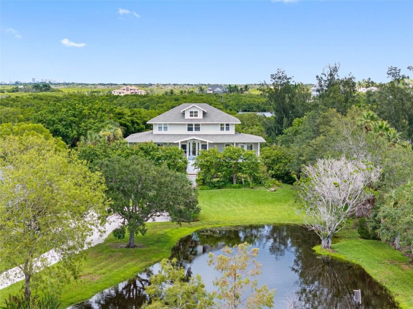 This remarkable Terra Ceia Island home stood strong through - Beach Home for sale in Terra Ceia, Florida on Beachhouse.com