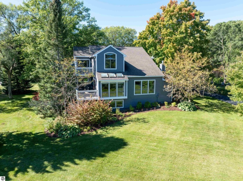 Rare opportunity to acquire a home and buildable lot next door - Beach Home for sale in Traverse City, Michigan on Beachhouse.com