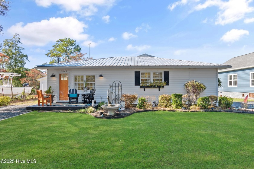 Experience the beauty of the Southern waterfront living in this - Beach Home for sale in Shallotte, North Carolina on Beachhouse.com