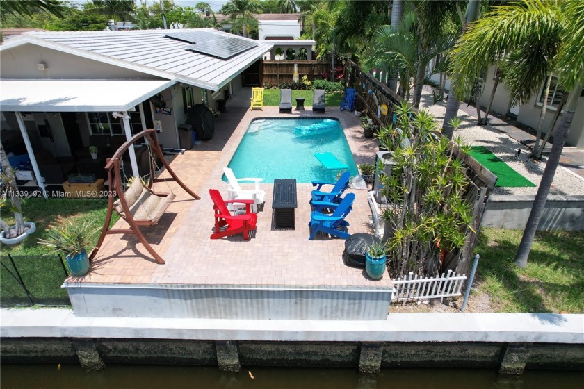 Three-unit waterfront  pool home. Income potential to approx - Beach Home for sale in Wilton  Manors, Florida on Beachhouse.com