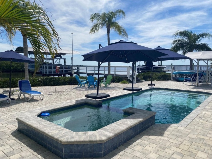 Experience waterfront living at its finest, at this direct Gulf - Beach Home for sale in Tarpon Springs, Florida on Beachhouse.com