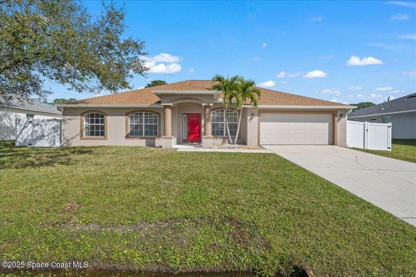 NEW PRICE! This spacious 4-bedroom, 2-bath home offers nearly 2 - Beach Home for sale in Palm Bay, Florida on Beachhouse.com