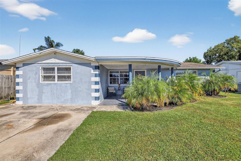Welcome to 3837 Darlington Road, a charming 3-bedroom, 2-bath - Beach Home for sale in Holiday, Florida on Beachhouse.com