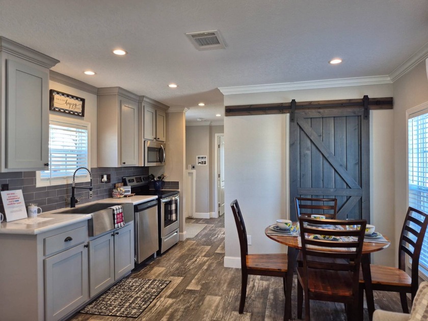 Brand New Champion Mobile Home Features:  -Gray cabinetry - Beach Home for sale in Merritt Island, Florida on Beachhouse.com