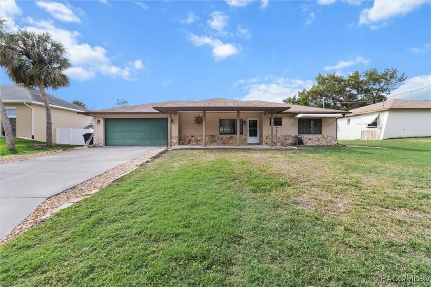 Stunning 3-Bed, 2-Bath Waterfront Pool Home with Boat Dock in - Beach Home for sale in Crystal River, Florida on Beachhouse.com