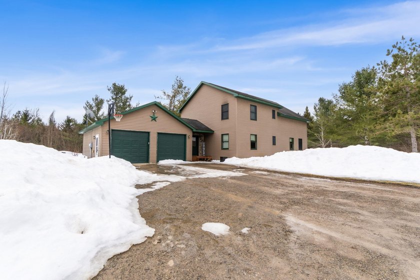 Custom-built, spacious 3-bedroom, 2-bath home featuring a bonus - Beach Home for sale in Cheboygan, Michigan on Beachhouse.com