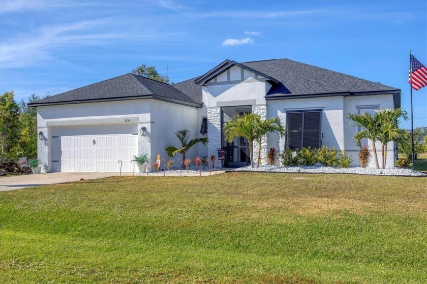 This beautifully upgraded 3-bedroom, 2-bathroom home with a - Beach Home for sale in Port Charlotte, Florida on Beachhouse.com