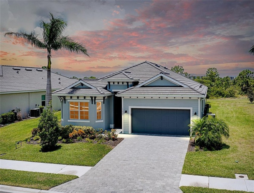 Welcome to this absolutely stunning home that includes full golf - Beach Home for sale in Venice, Florida on Beachhouse.com