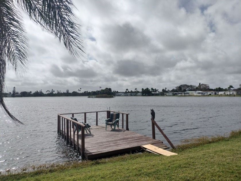 SPANNING LAKE VIEWS IN PALM LAKE CLUB 55+! FULLY FURNISHED 2 bed - Beach Home for sale in Sebastian, Florida on Beachhouse.com