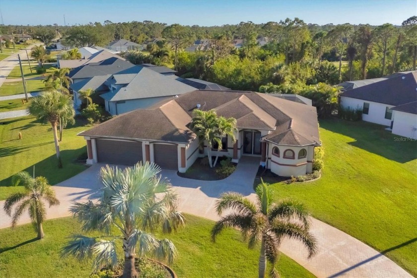 Must See... 3 Car Garage Pool home on an Oversized Corner Lot - Beach Home for sale in Rotonda West, Florida on Beachhouse.com