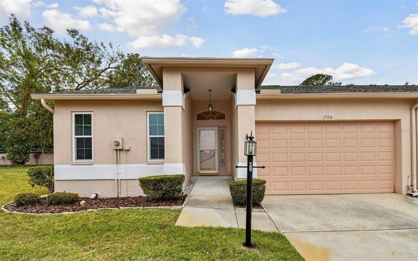 Nestled at the end of a dead-end street, this villa boasts the - Beach Home for sale in Palm Harbor, Florida on Beachhouse.com