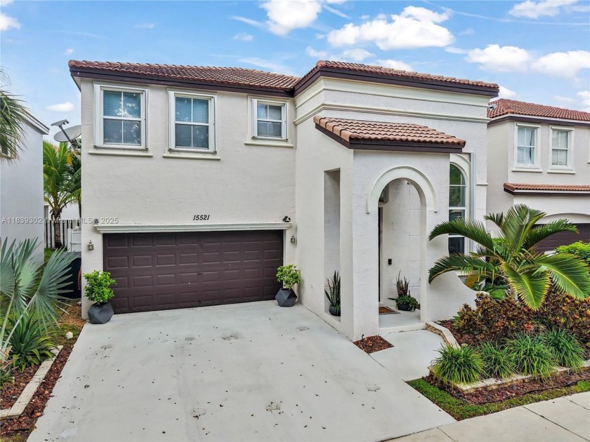 Welcome to this elegant 4-bedroom, 2.5-bath home nestled in a - Beach Home for sale in Miramar, Florida on Beachhouse.com