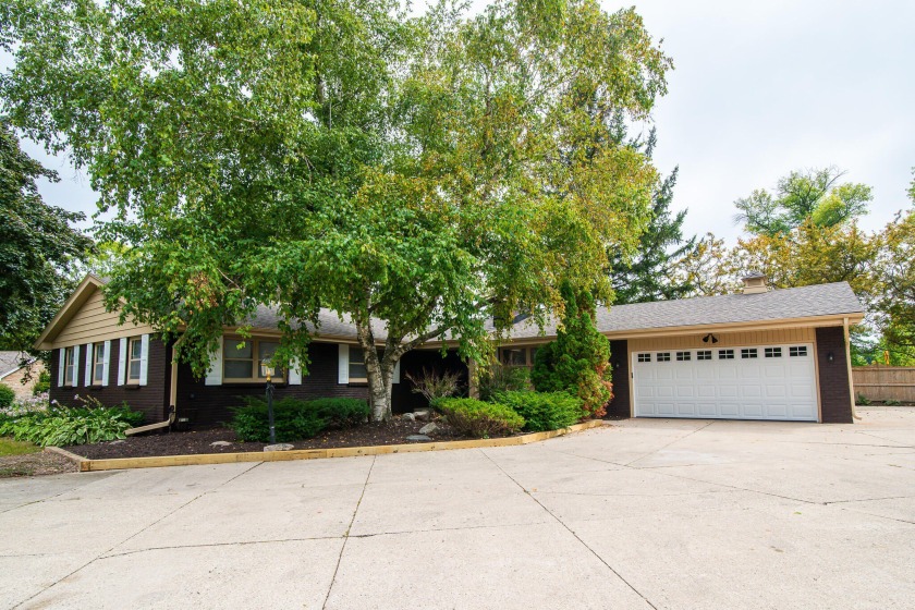 Welcome to 7412 N Boyd Way, a generously updated 4-bedroom - Beach Home for sale in Milwaukee, Wisconsin on Beachhouse.com