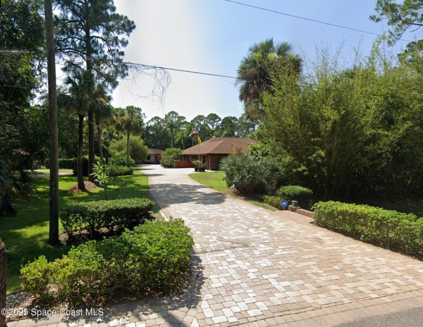 Meticulously maintained 3 bed 2 bath pool home on 1.07 acres in - Beach Home for sale in Titusville, Florida on Beachhouse.com