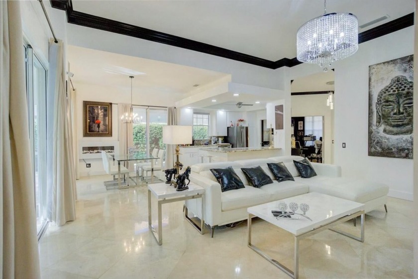 Exquisitely renovated, this 3-bedroom plus den, 2-bathroom home - Beach Home for sale in Palm Beach Gardens, Florida on Beachhouse.com